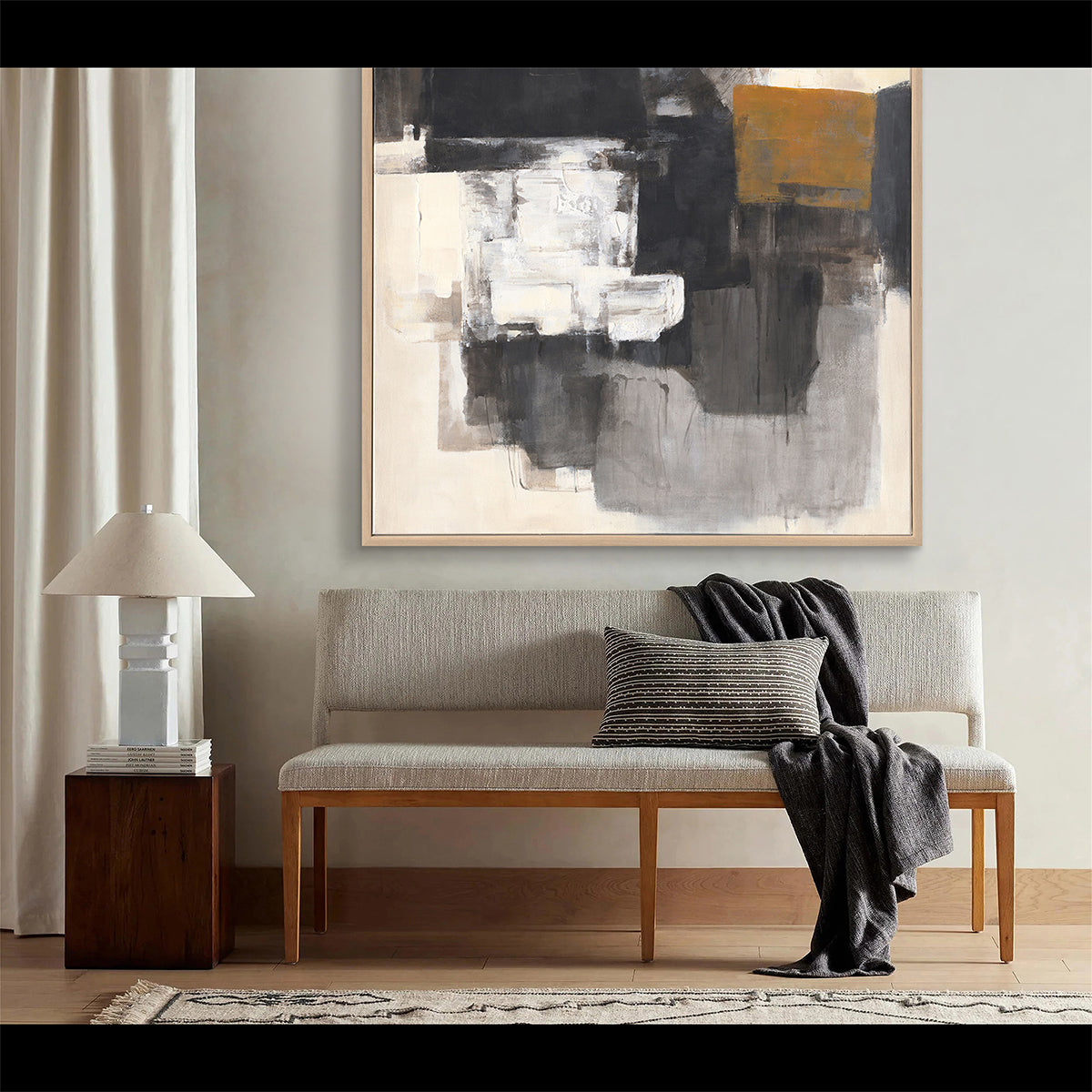 Bold contrasts in black and ochre create depth, drama, and timeless modern elegance